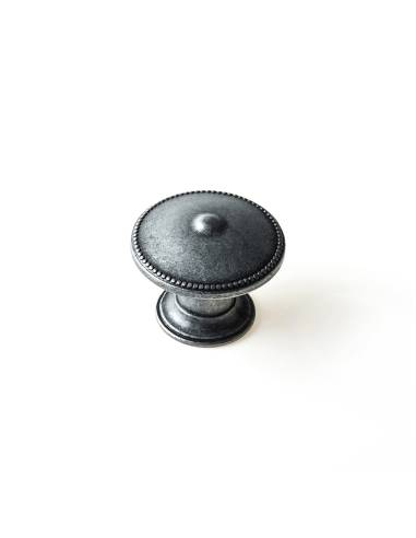 Blíster com 4 puxadores redondos para móveis. fabricado em zamak e acabamento prata envelhecida. mod. 3121 ø30mm. rei